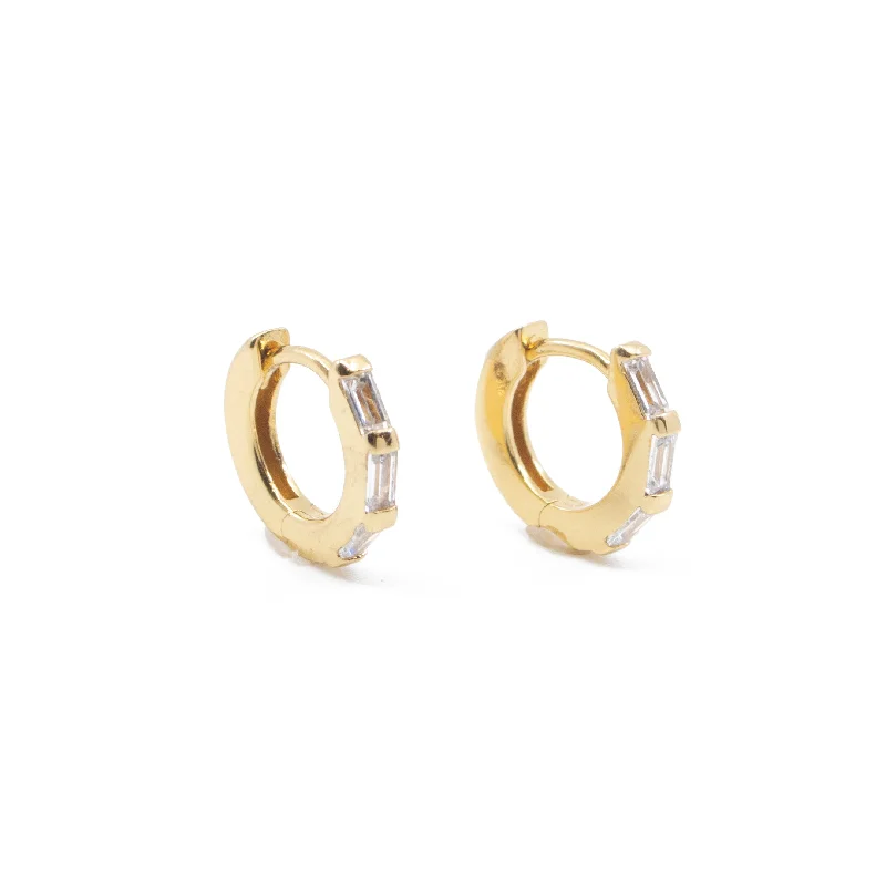 ladies' star earrings -Clear CZ Baguette Huggie Hoop Earrings in Gold